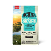 ACANA Wholesome Grains Puppy kibble close-up with salmon and pork for growing puppies.