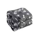 AIWEK dog blanket with paw bone pattern protects furniture and keeps pets warm.