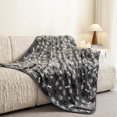 AIWEK paw bone pattern blanket used in car trips for comfort.
