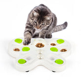 ALL FOR PAWS butterfly-shaped feeder engages indoor cats with interactive play and mental enrichment.