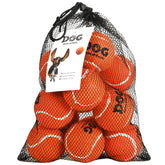 AMA SPORT dog tennis balls in bright orange for high-visibility play in grass.