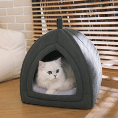 Amazon Basics Cat Cave Bed non-slip base prevents slipping on floors.