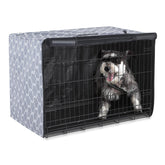 Amazon Basics dog crate cover on a 36-inch crate providing den-like privacy