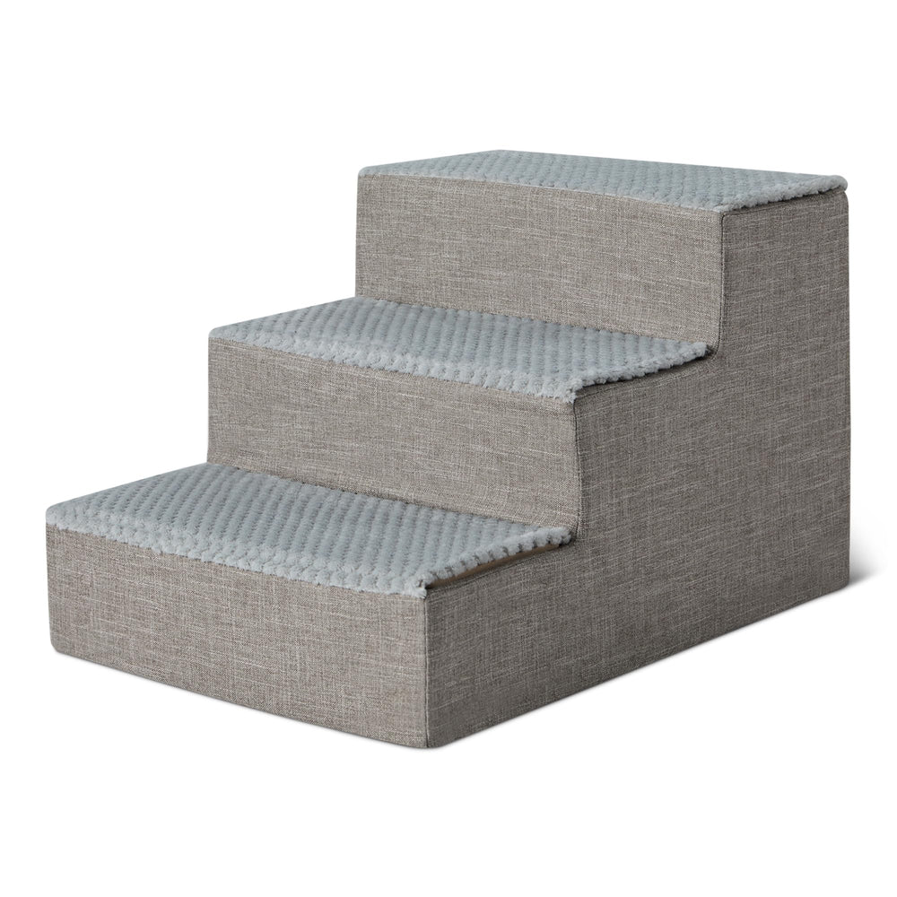 Amazon Basics dog steps beside a bed help pets climb up safely