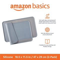 Raised edges contain spills for bowls and water during feeding.