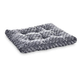Amazon Basics washable bed plush crate pad provides a cozy resting space for pets.