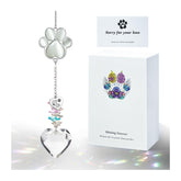 AMETHUARTZ pet memorial suncatcher: paw crystal shines in sunlight, creating comforting memories.
