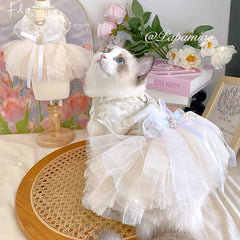 ANIAC dress embroidery close-up showing fine stitching
