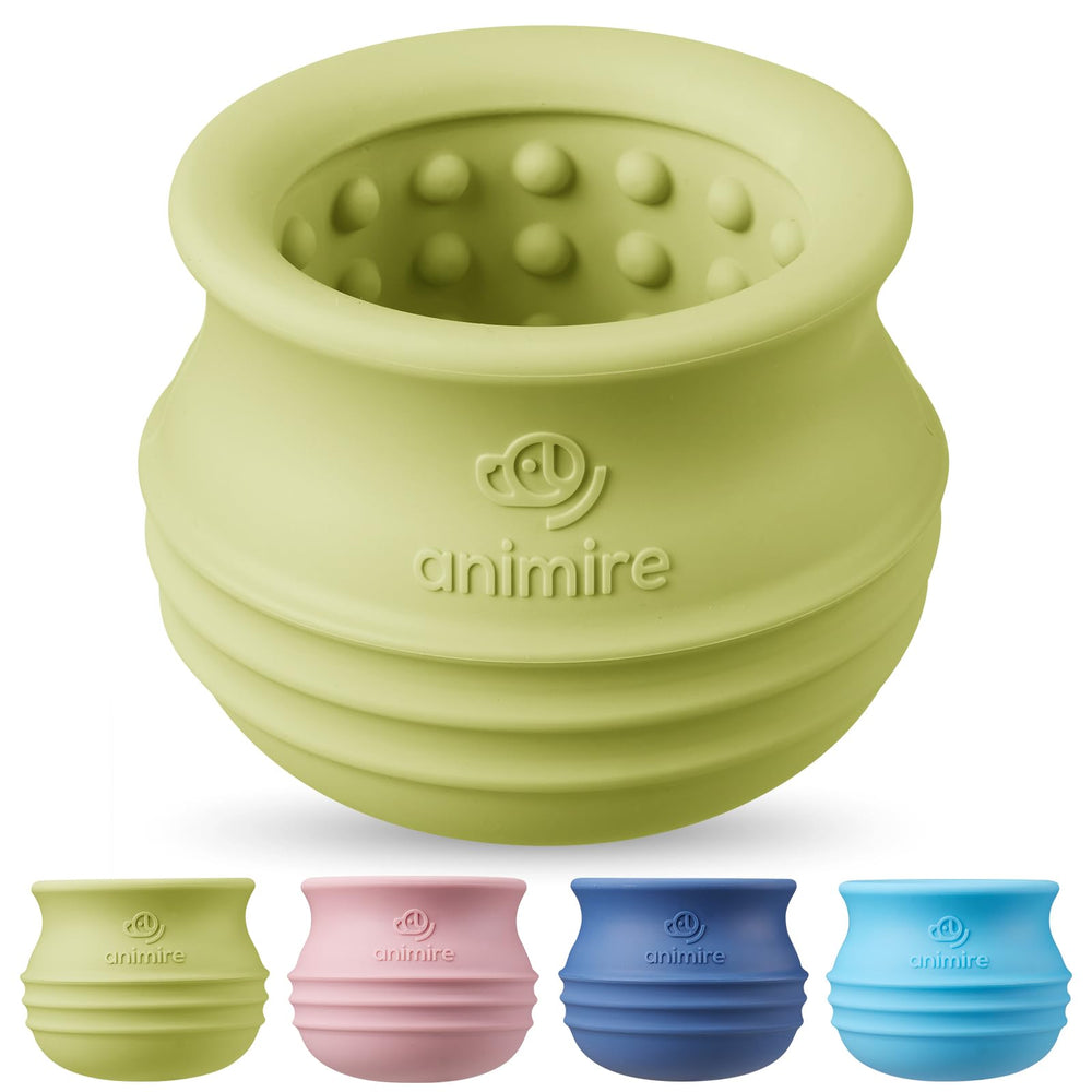 Animire Treat Dispensing Dog Toy in green with wobble for engaging mealtime.
