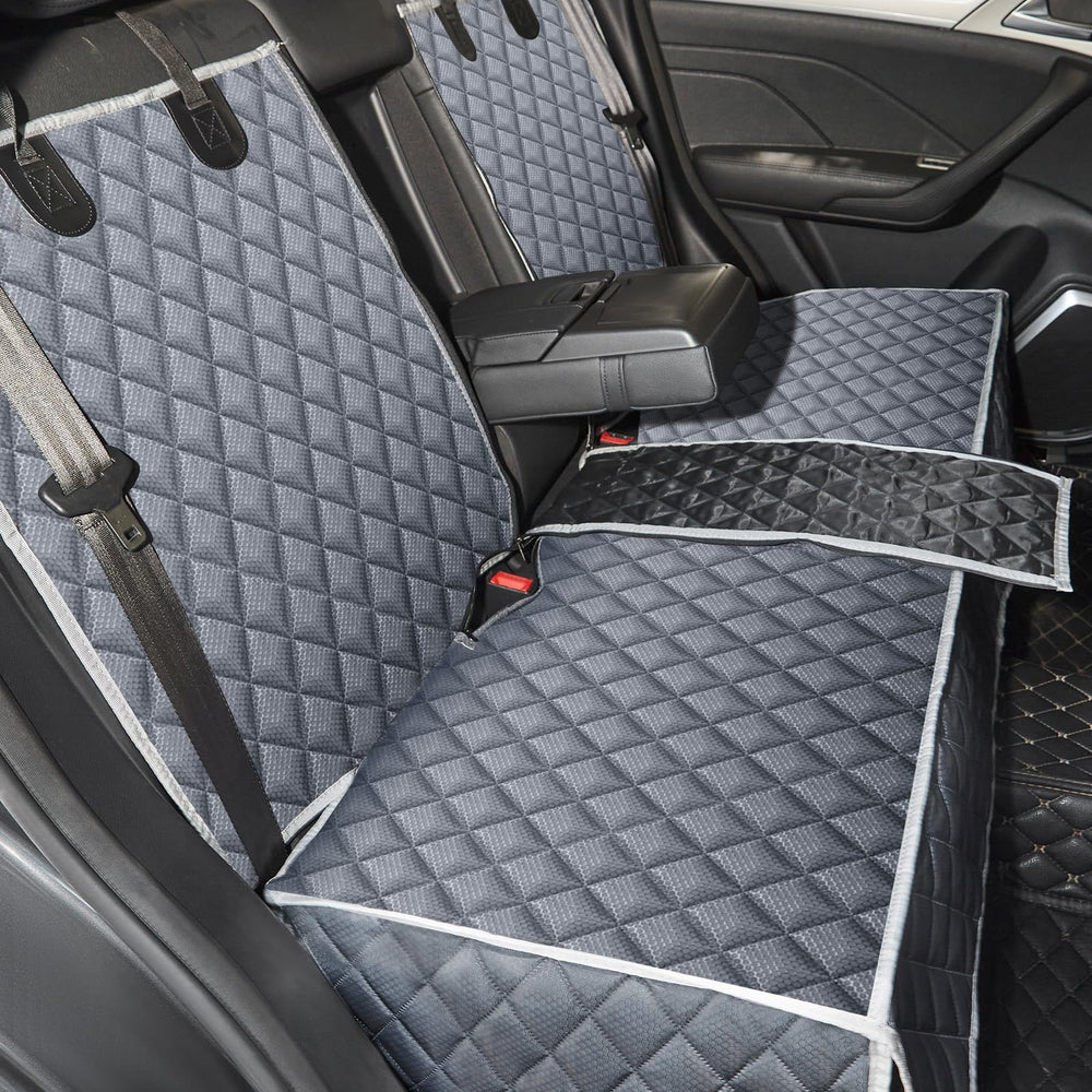 ANOSOSPECIAL Grey dog seat cover on back seat showing non-stick fur protection and easy cleanup.