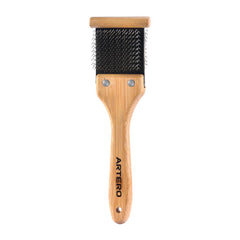 Artero Double Flexible Brush gray-side pins spreads coat and opens fur for grooming.