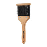 Artero Double Flexible Brush untangles coat for knot-free brushing.