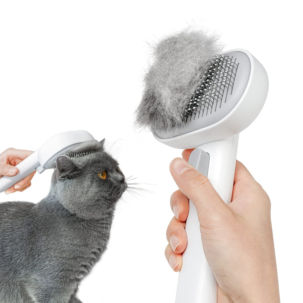 Aumuca Cat Brush with release button for quick cleaning and hair removal.