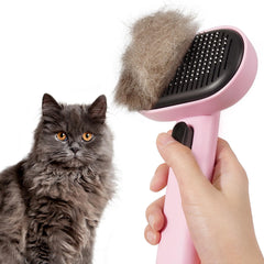Aumuca cat brush with self-cleaning button for quick grooming.