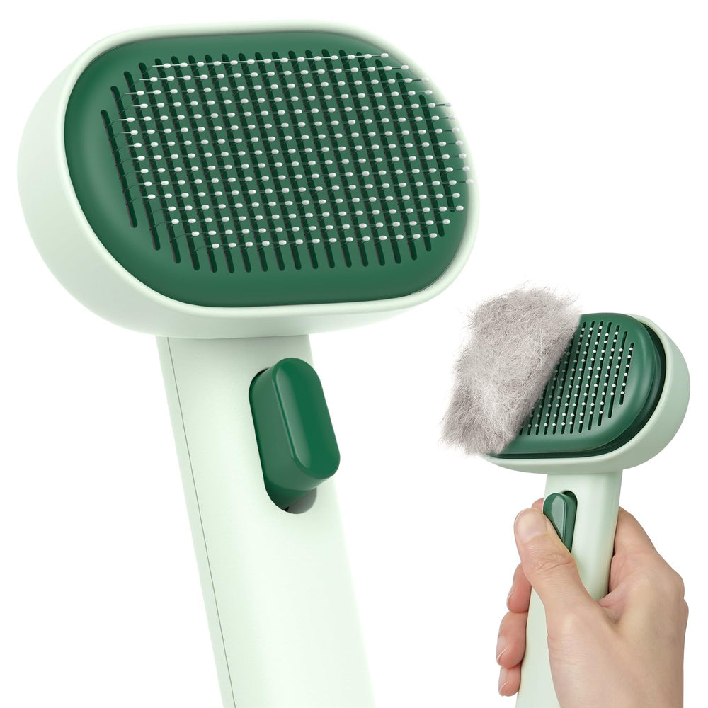 Aumuca cat brush top view in forest green showing ergonomic design for easy grooming