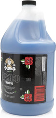 Bark2Basics Rock the Dog deshedding shampoo bottle pour demonstrates easy dilution for salon-grade care.