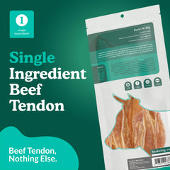 Dog actively chewing BARK'N BIG tendon chew, ideal for power chewers.