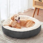 BedStill donut bed in large dark grey with faux fur for cozy lounging and relaxation.