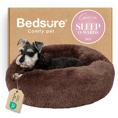 Bedsure calming dog bed with donut shape offers secure, cozy curl-up comfort for pets.