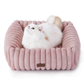 Bedsure ComfyFleece bed top view shows a soft blush pink cushion for small pets' cozy naps.