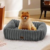 Bedsure ComfyFleece dog bed top view in warm grey, cozy nap spot ready.