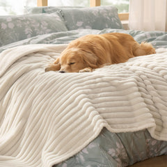 Bedsure ComfyFleece waterproof dog blanket 60x80 cream protects furniture from spills and fur.