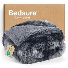 Bedsure waterproof fleece dog blanket protecting furniture from spills.