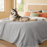 Bedsure waterproof blanket on bed with Sherpa side for cozy warmth and protection.