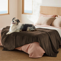 Bedsure blanket - sherpa-inside for warmth and pet comfort.