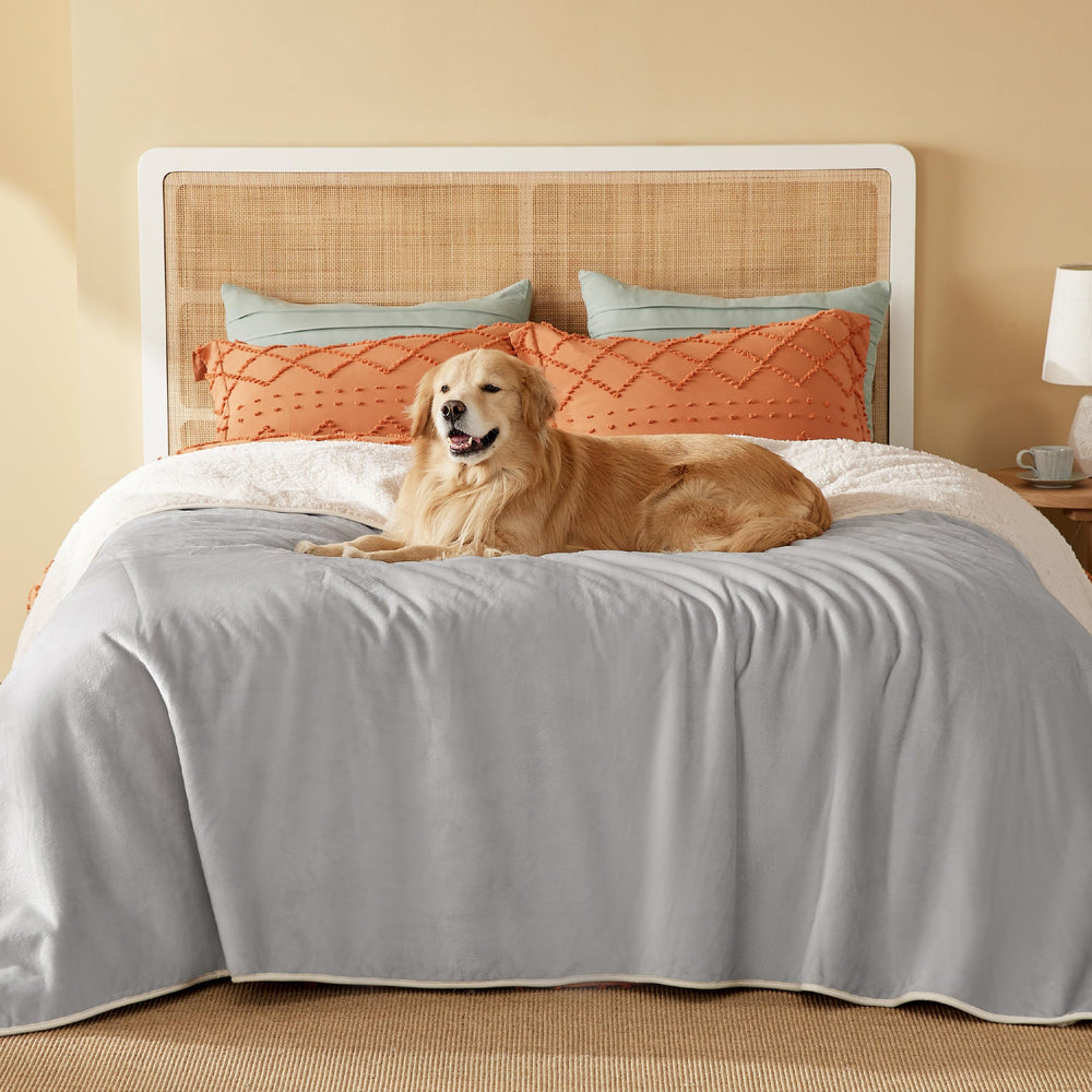 Bedsure waterproof blanket with Sherpa side keeps large dogs cozy on the bed
