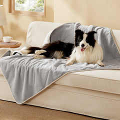 Bedsure waterproof dog blanket with sherpa side protects furniture from spills.