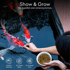 Big Kahuna Tropical Fish floating koi pellets for easy feeding at pond surface.