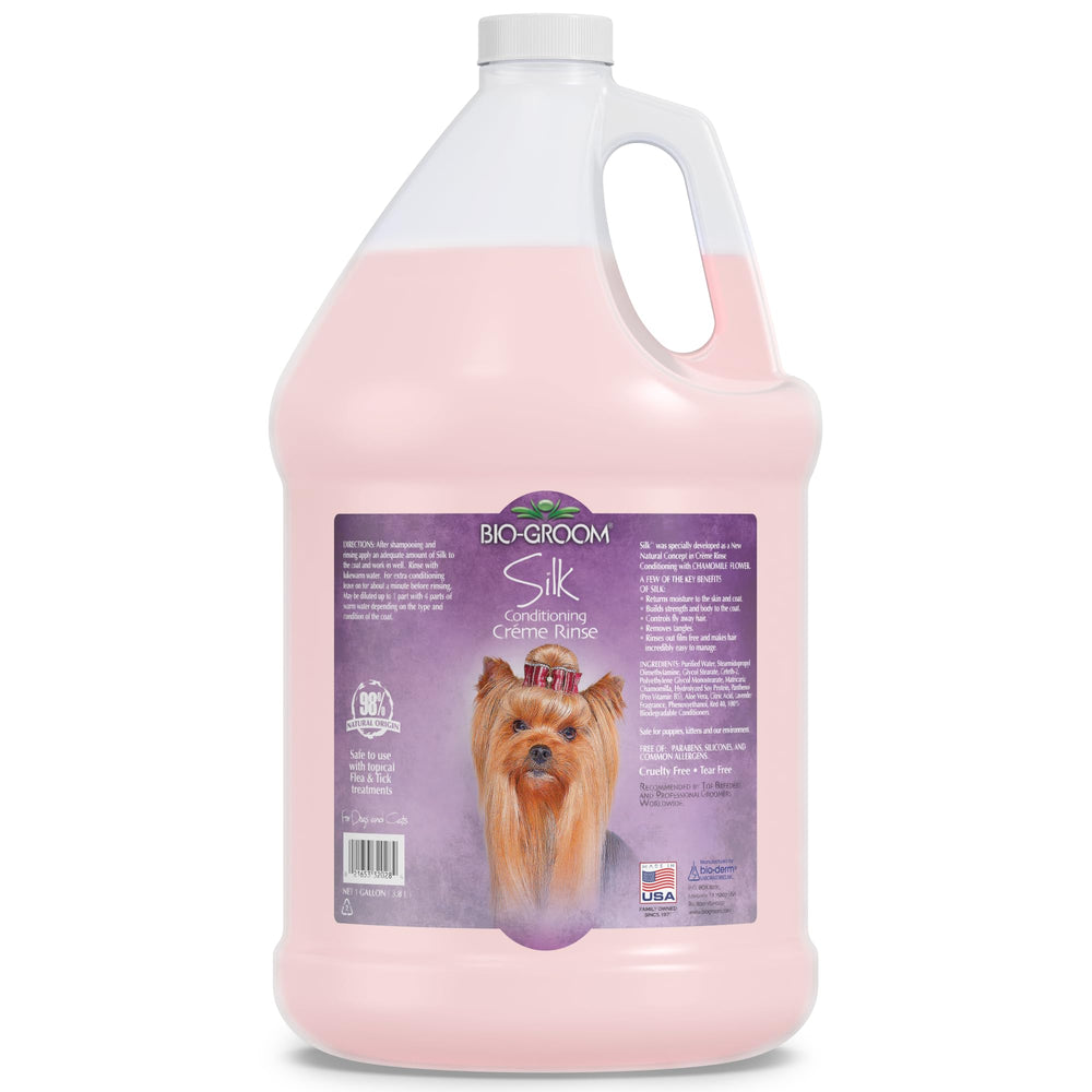 Bio-Groom Silk Creme Rinse bottle pouring for a silky, residue-free dog coat.