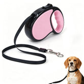Birddie retractable leash with pink anti-slip handle for comfortable walks.