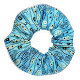 Birdsbesafe Bejeweled Stripes collar cover on a calm cat increases bird visibility.