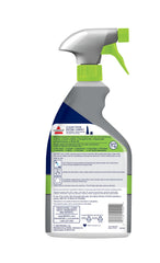 Bissell Pet Pro bottle shown beside a stained carpet in living room