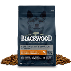 Blackwood Sensitive Skin & Stomach dog food bag showing lamb meal and ancient grains for gentle digestion.