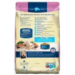 Blue Buffalo real chicken first ingredient close-up on dry puppy kibble.