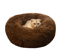 BODISEINT pet bed with donut shape provides cozy support for cats and small dogs.