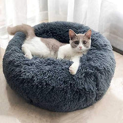 BODISEINT round pet bed with non-slip bottom keeps it in place on tile or wood floors