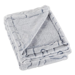 Soft surface of the Bone Dry blanket ready for crate or car trips and easy care.