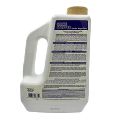 Bonide Snake Stopper spray bottle in hand for sheds and fences