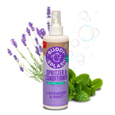 Buddy Splash Spritzer lavender-mint bottle provides a calming grooming session.