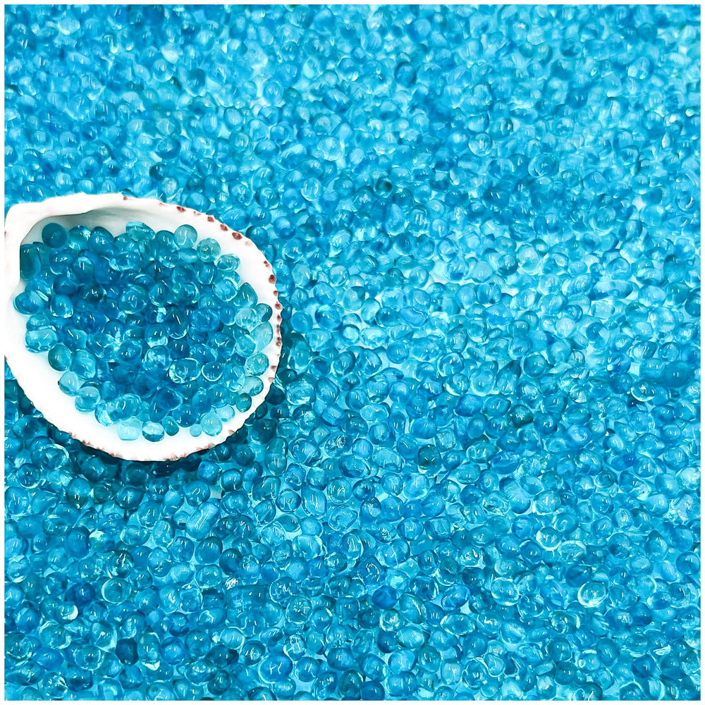 BXI blue glass sand for aquarium substrate, vibrant color and safe for fish.