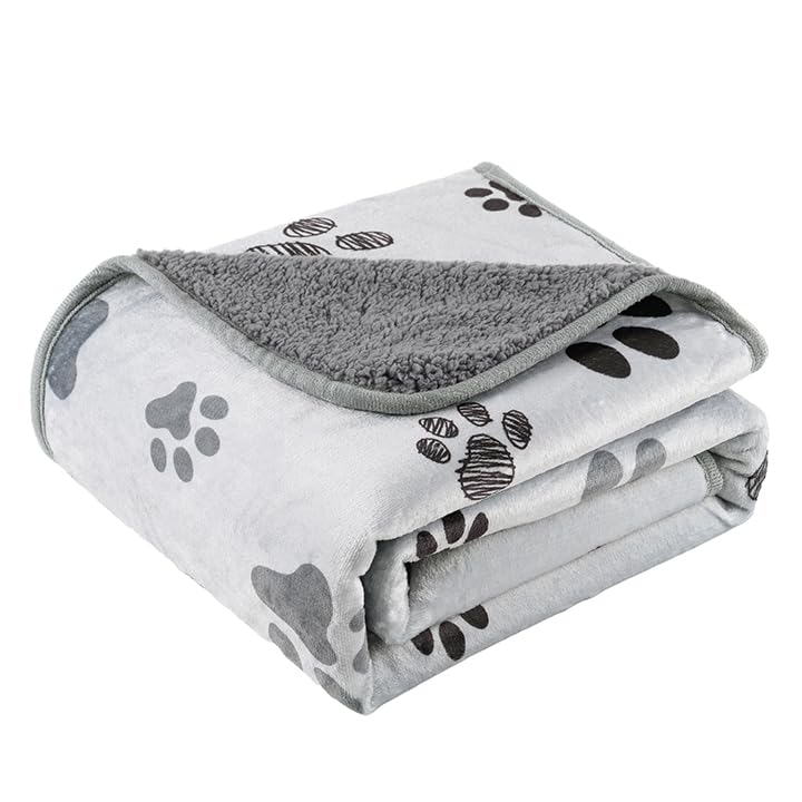 CAPT.SNOOZE waterproof dog blanket on a sofa protects against spills