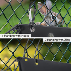 CAIQINLI hay feeder mounted in cage with straps and buckles securing it.