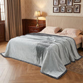 Catalonia waterproof blanket bed cover protects furniture from spills and moisture.