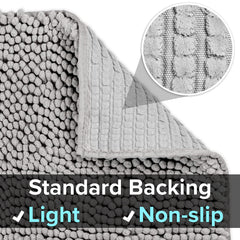 CatGuru XXL grey mat folded for easy cleaning and shaking.