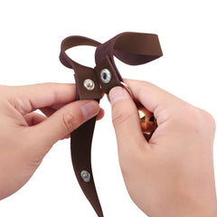 CATHYLIFE doorbell with adjustable length demonstrates versatile hanging for any dog size.