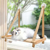 CATISM cat window perch mounted on sunny window, stable with four suction cups.